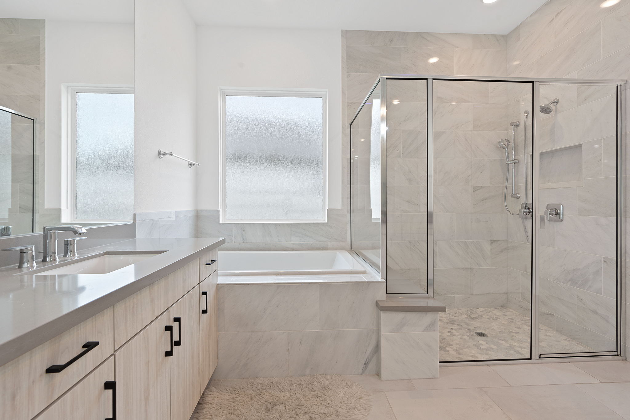 309 Pear Tree Lane Austin, TX 78737 - Photo 23 of 39 a bathroom with a bathtub and a sink