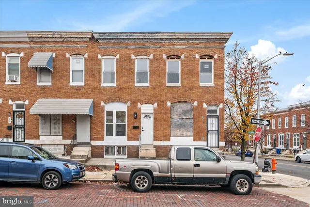 a car parked in front of a building