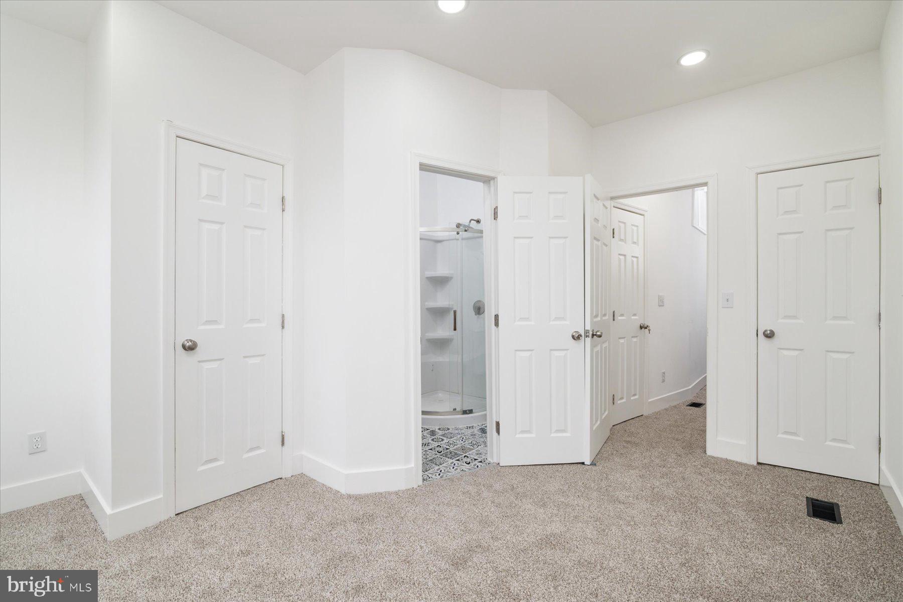 62 Gorman Avenue Baltimore, MD 21223 - Photo 15 of 24 an empty room with closet and a bathroom