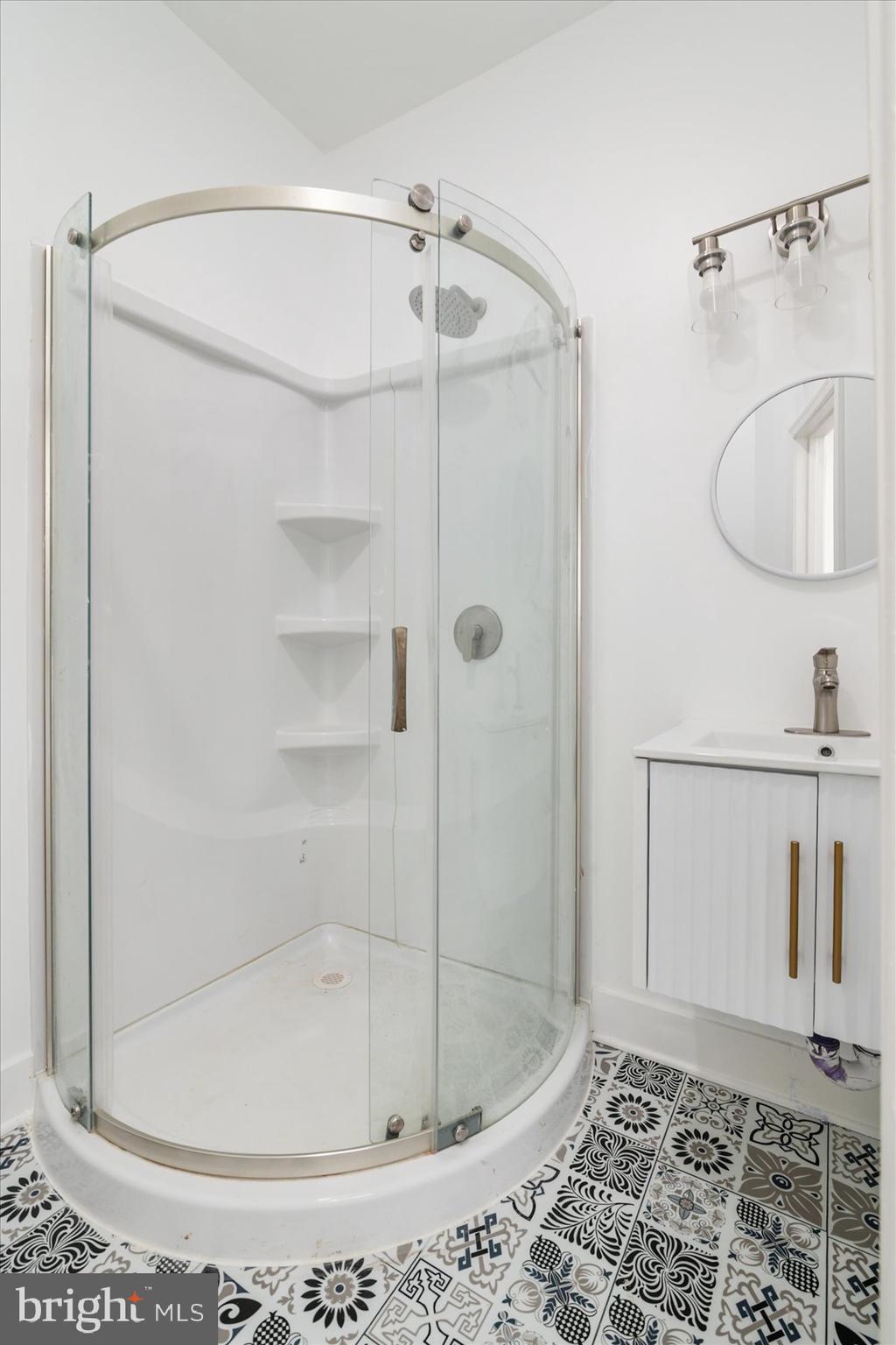 62 Gorman Avenue Baltimore, MD 21223 - Photo 16 of 24 a bathroom with a shower