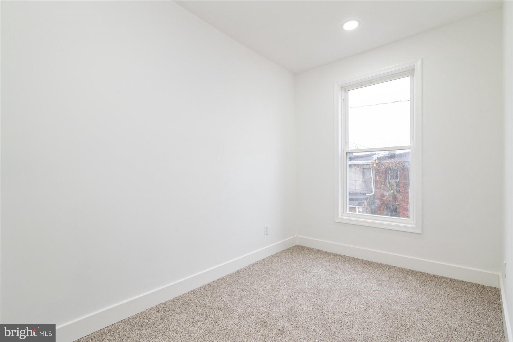 62 Gorman Avenue Baltimore, MD 21223 - Photo 19 of 24 an empty room with a window