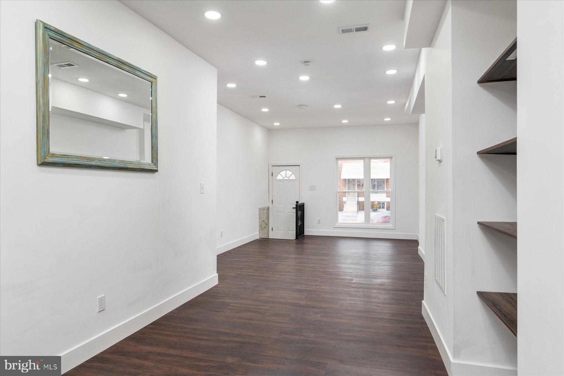 62 Gorman Avenue Baltimore, MD 21223 - Photo 8 of 24 a view of livingroom with wooden floor