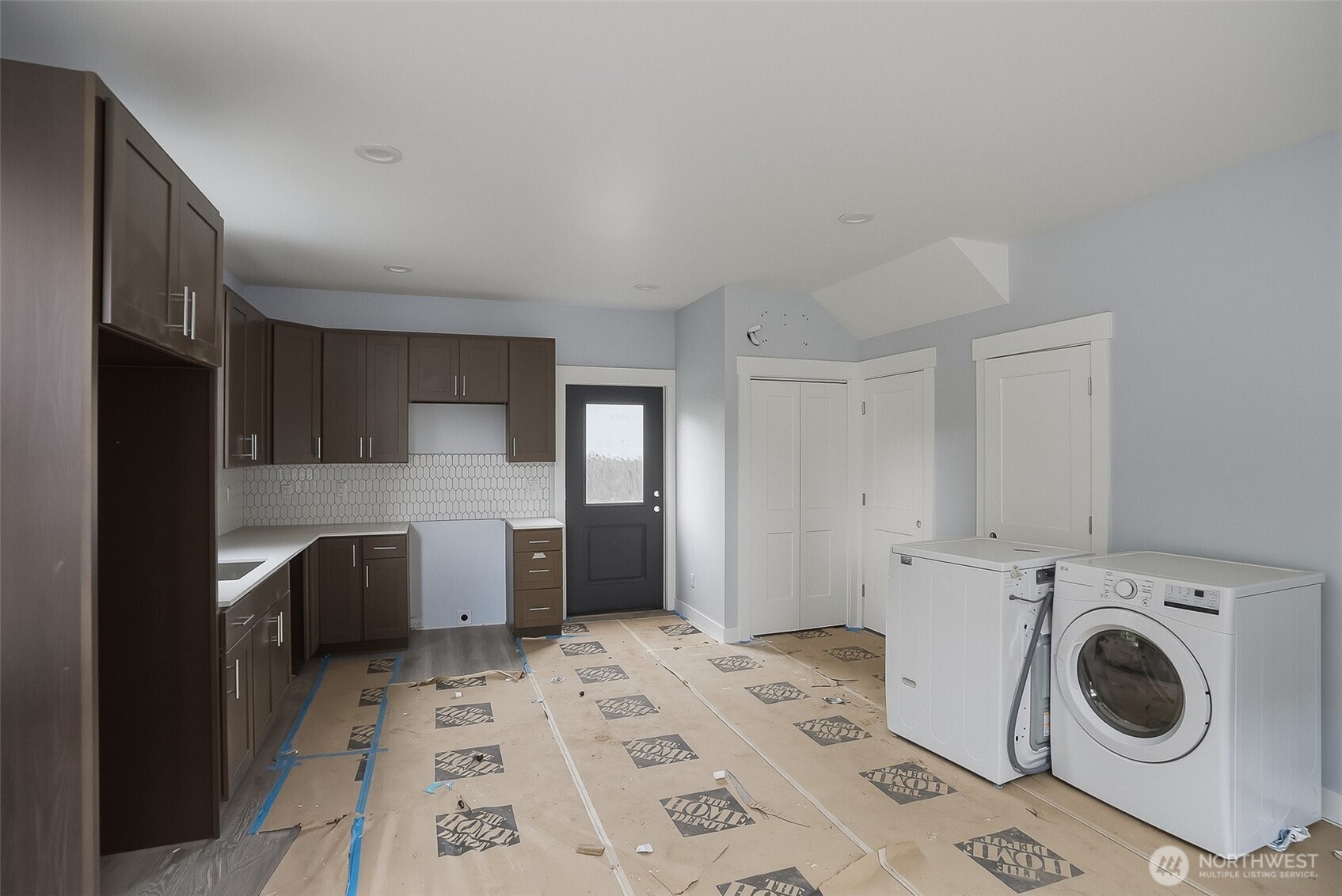 2317 22nd Avenue South Seattle, WA 98144 - Photo 15 of 29 a view of a kitchen with sink washer and dryer