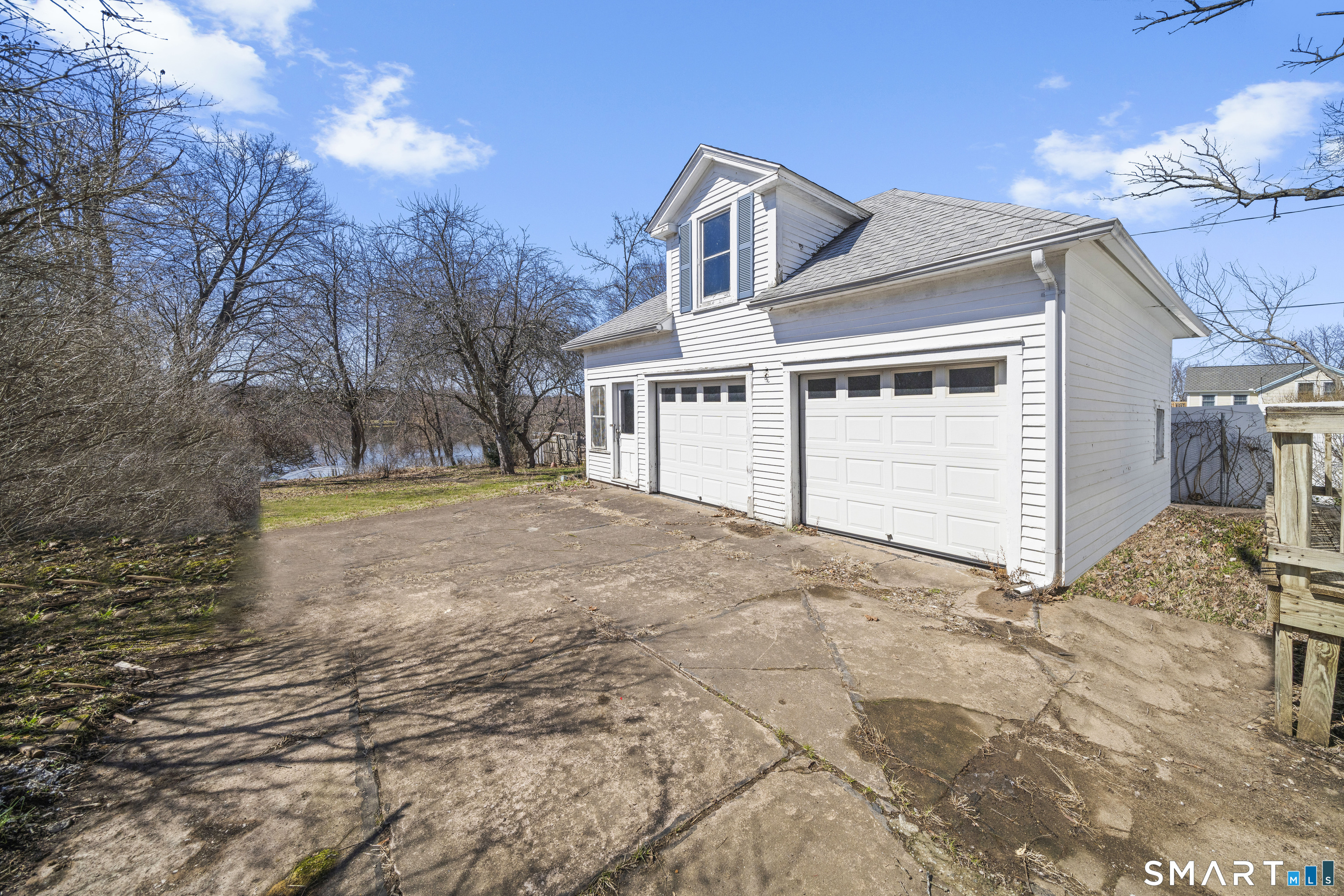 56 South River Street Enfield, CT 06082 - Photo 23 of 38 a view of a house with a yard