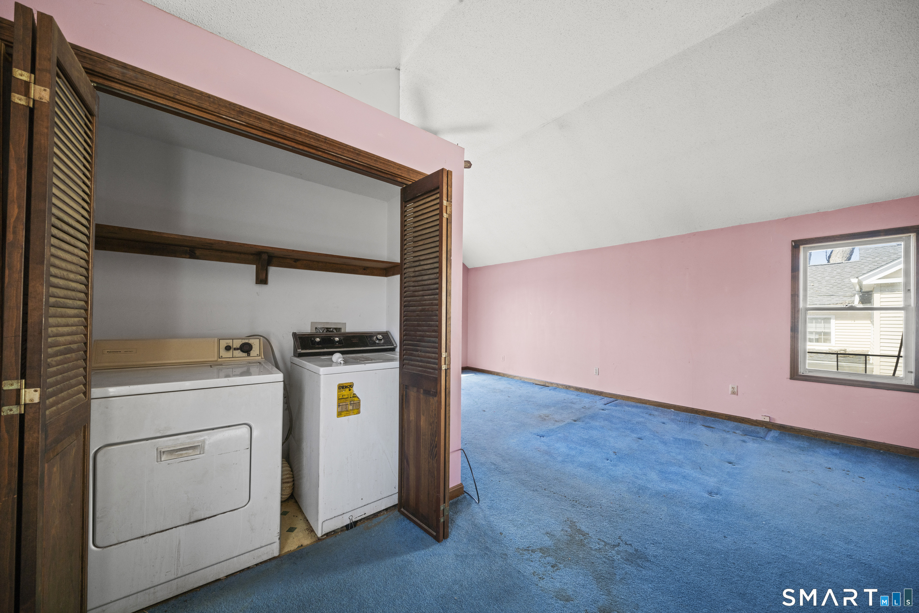 56 South River Street Enfield, CT 06082 - Photo 32 of 38 a utility room with dryer and washer