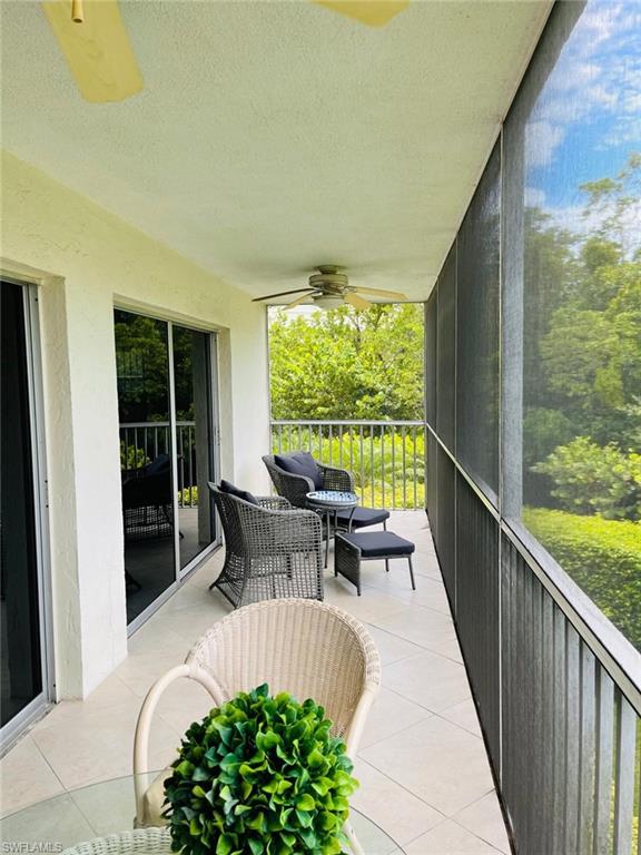 1 Bluebill Avenue, Unit 210 Naples, FL 34108 - Photo 2 of 17 a outdoor view with a sitting space