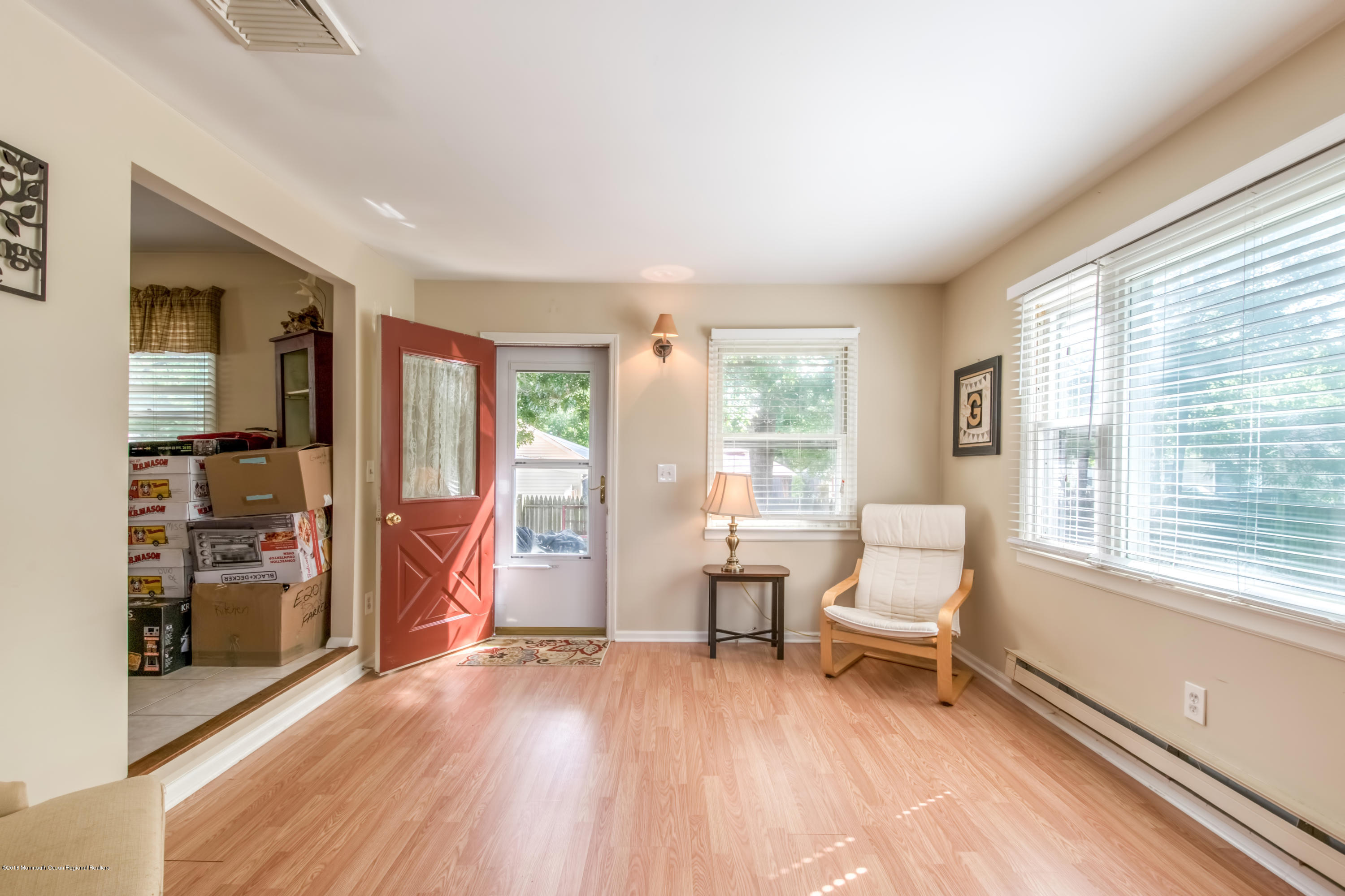 156 Captain Road Manahawkin, NJ 08050 - Photo 17 of 39 a living room with furniture and a wooden floor