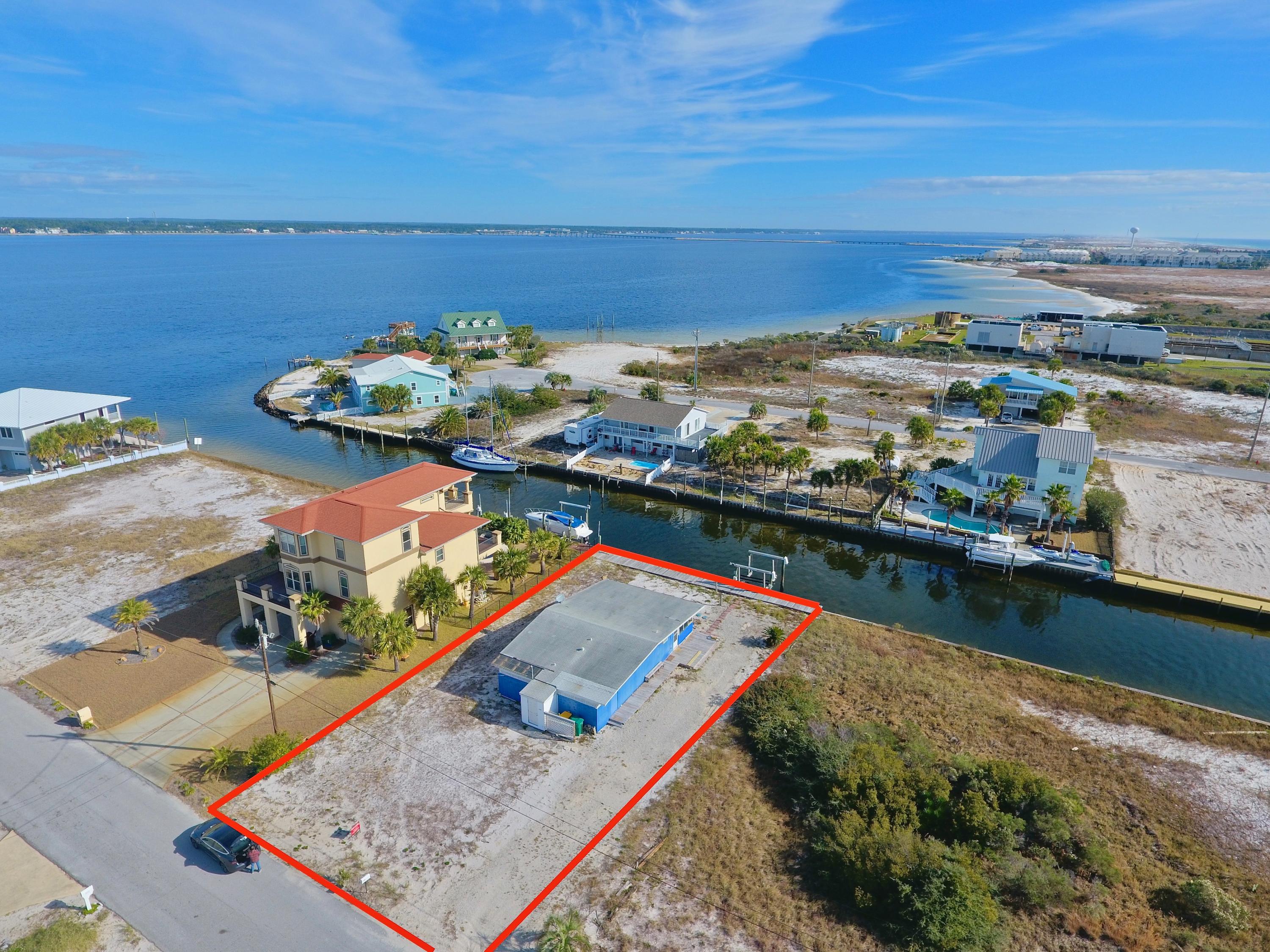 1468 Alabama Street Navarre, FL 32566 - Photo 2 of 9 an aerial view of a house with a ocean view