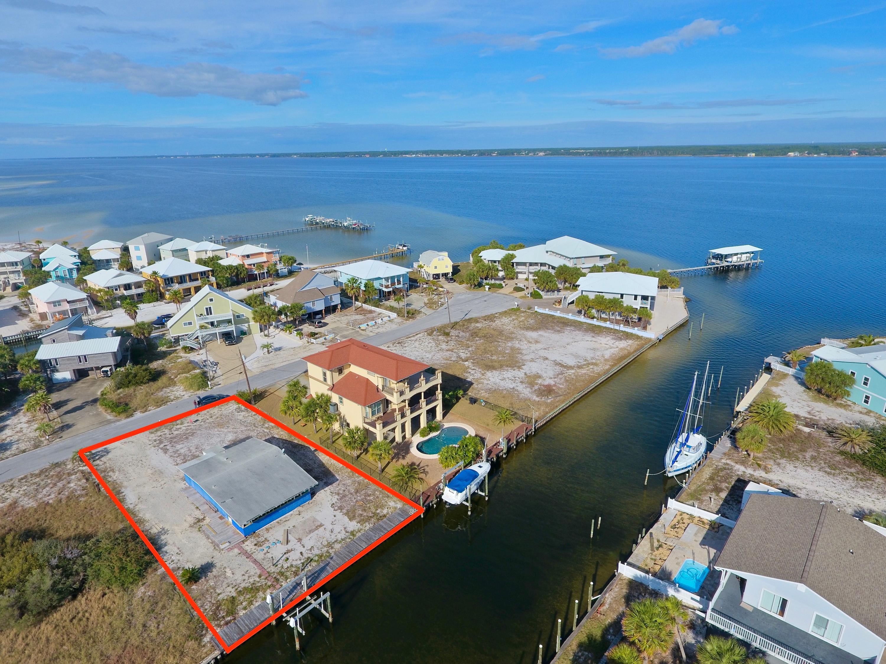 1468 Alabama Street Navarre, FL 32566 - Photo 4 of 9 an aerial view of residential houses with outdoor space