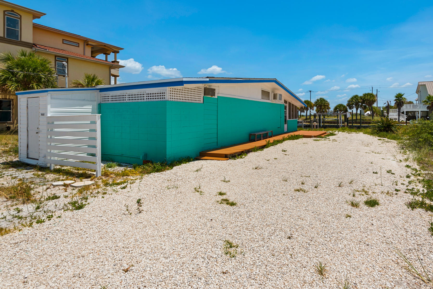 1468 Alabama Street Navarre, FL 32566 - Photo 5 of 9 a view of a back yard of the house