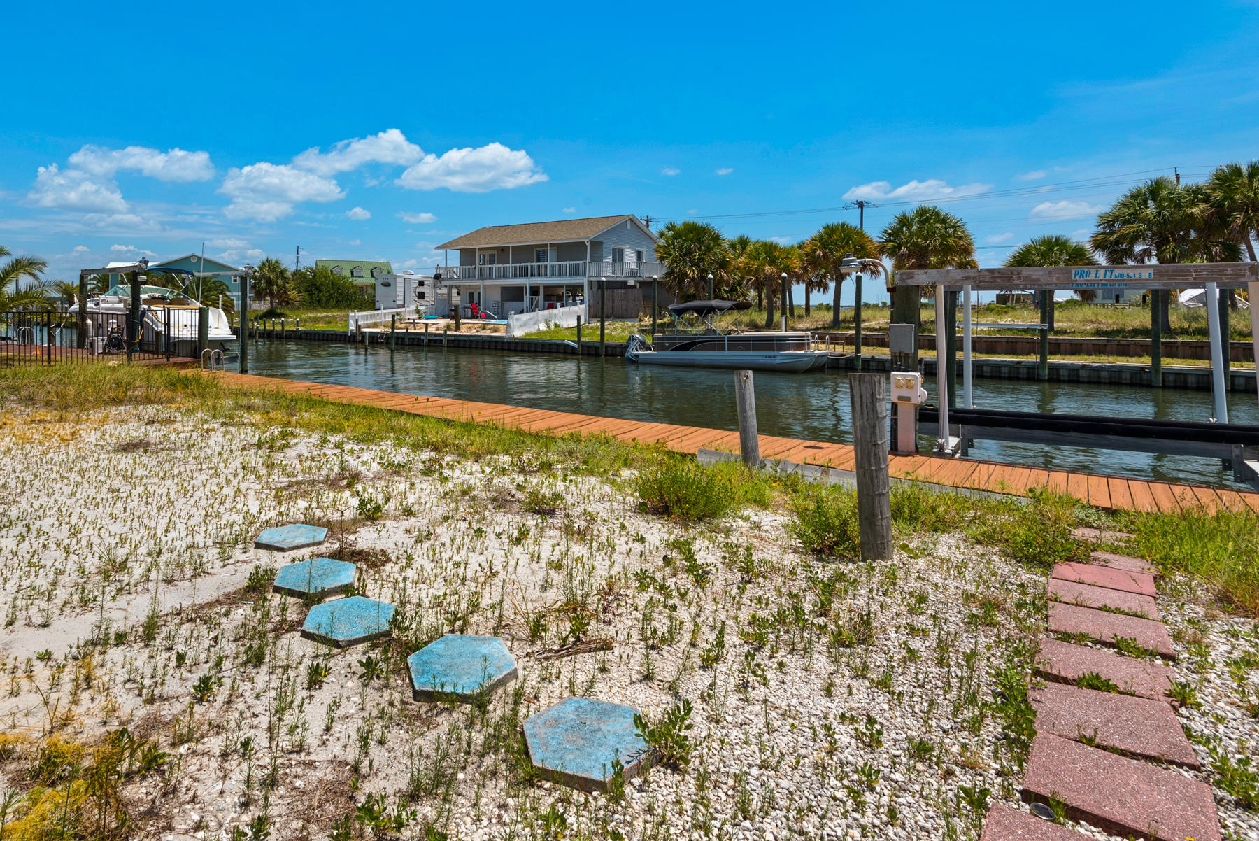 1468 Alabama Street Navarre, FL 32566 - Photo 7 of 9 a view of a lake