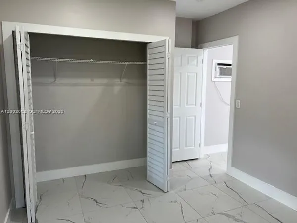 an empty room with closet