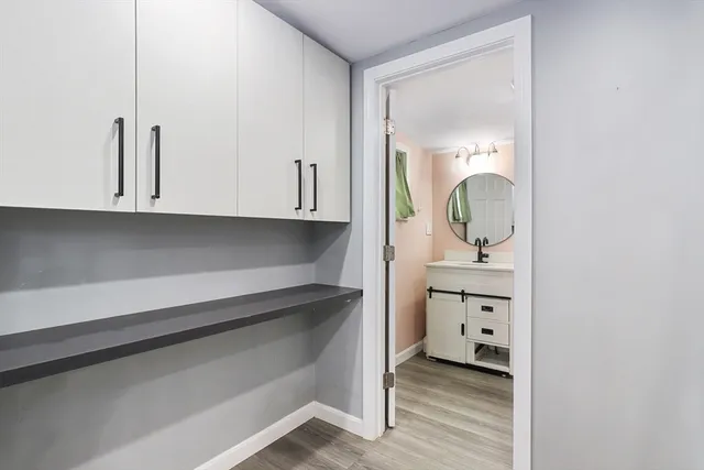 a view of cabinets and wooden floor