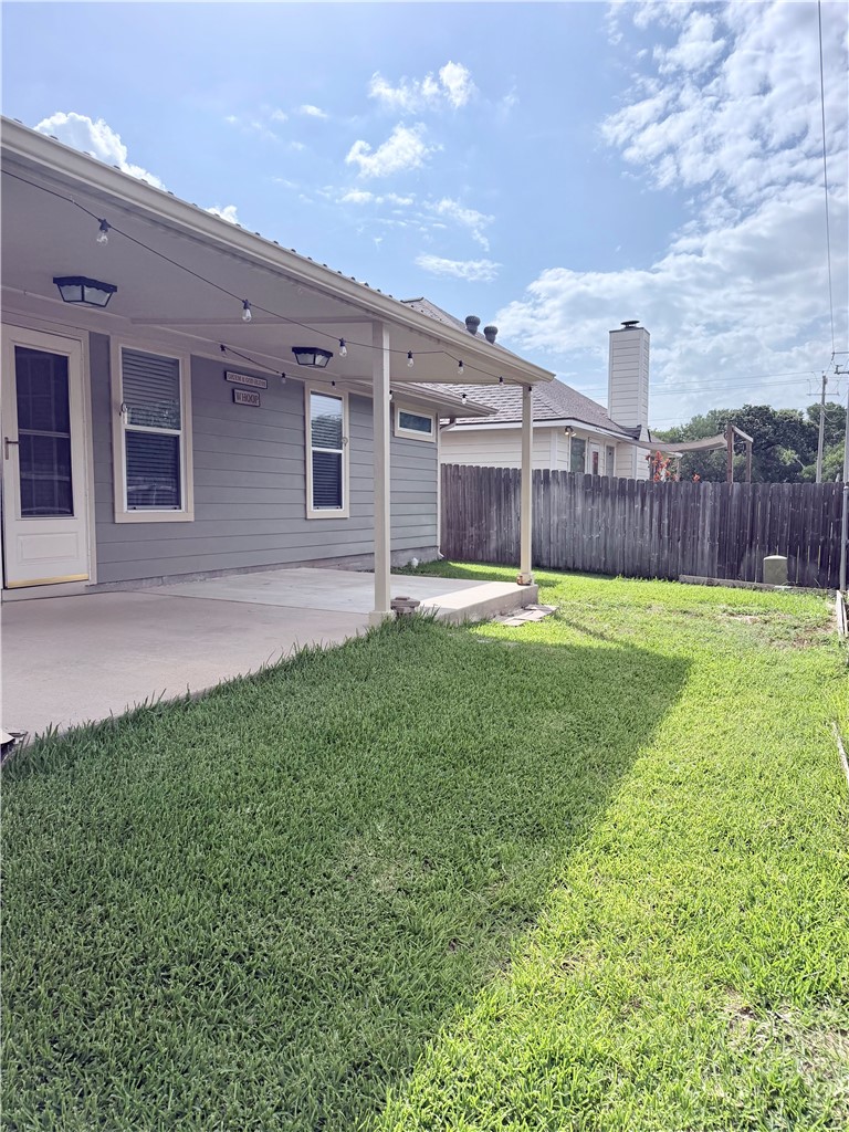 1029 Fallbrook Loop College Station, TX 77845 - Photo 32 of 34 a view of a backyard with a garden