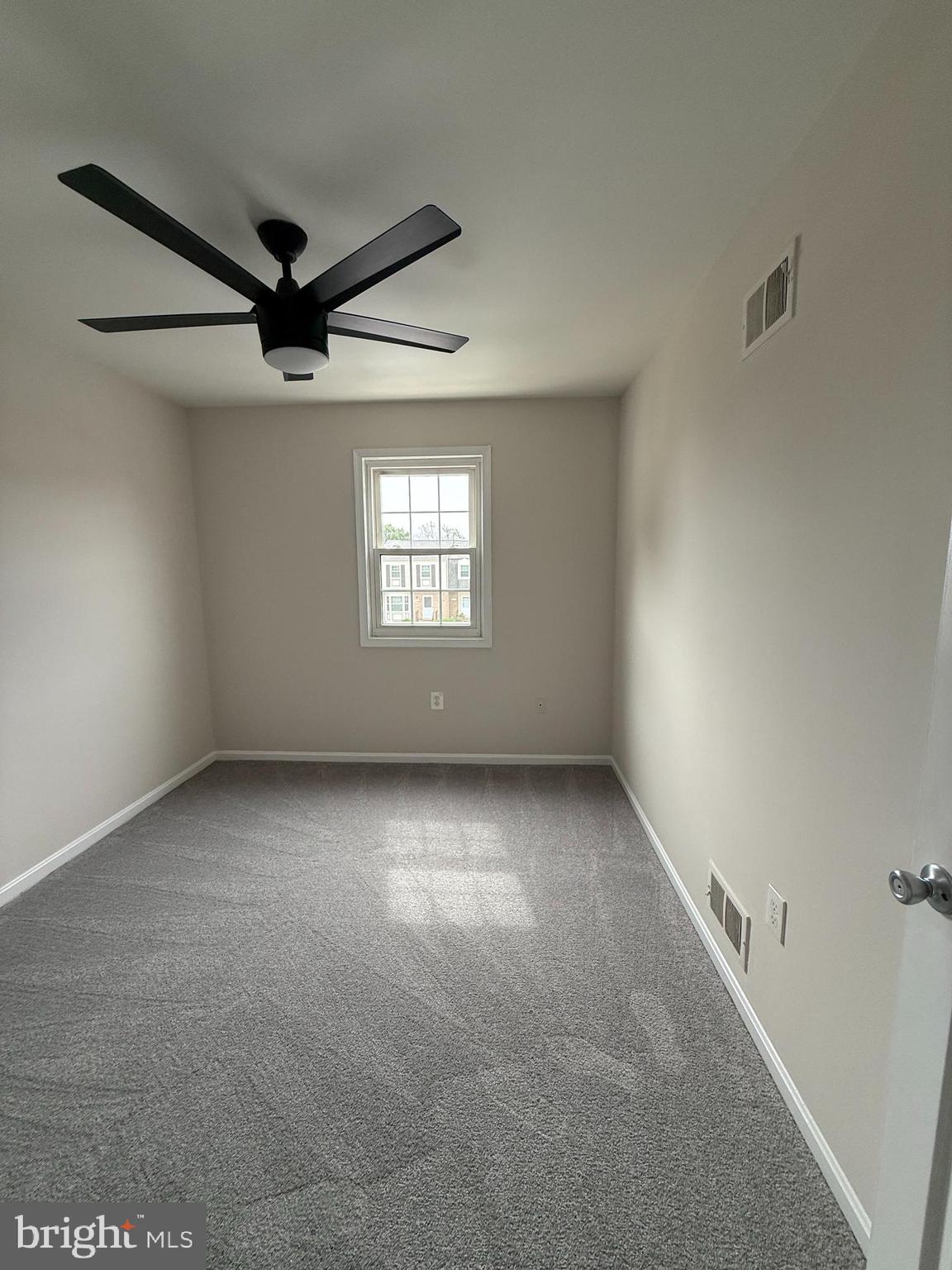 3801 Tremayne Terrace Silver Spring, MD 20906 - Photo 16 of 25 a view of an empty room with a window