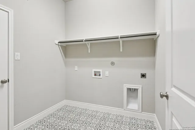 a living room with furniture a fireplace and a table