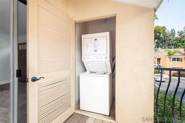a view of sign board with flower plants