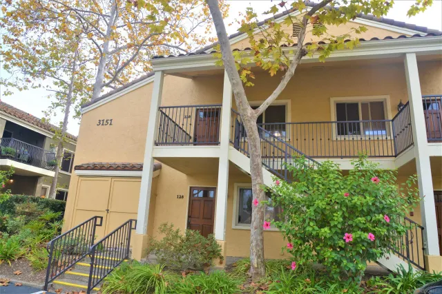 a view of a swimming pool with lounge chair