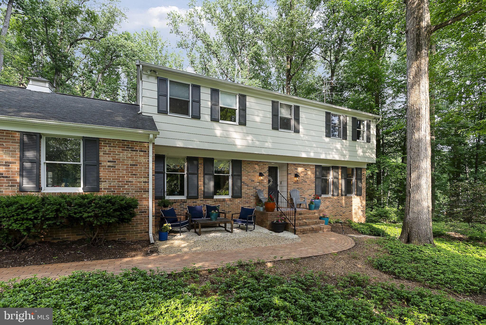12851 Stone Eagle Road Phoenix, MD 21131 - Photo 8 of 67 a view of a house with backyard sitting area and garden