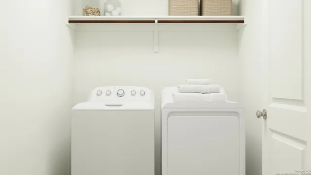 a utility room with dryer and washer