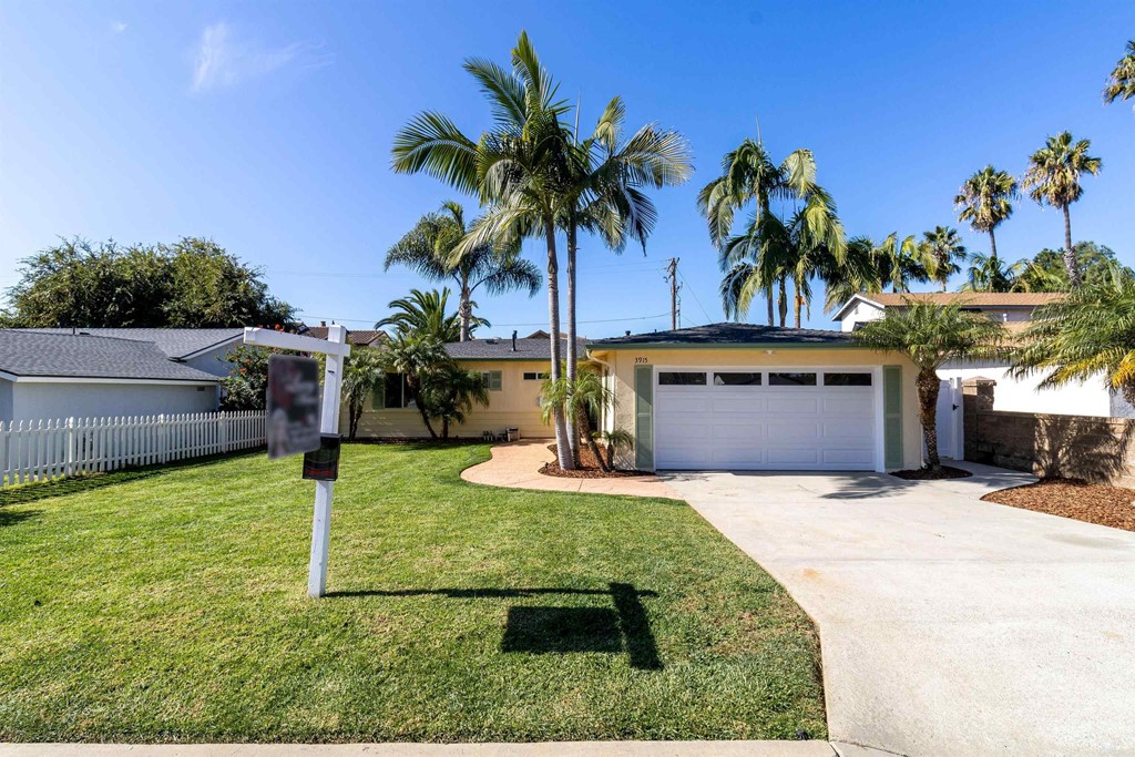 3915 Linmar Lane Carlsbad, CA 92008 - Photo 1 of 25 a front view of house with yard and green space