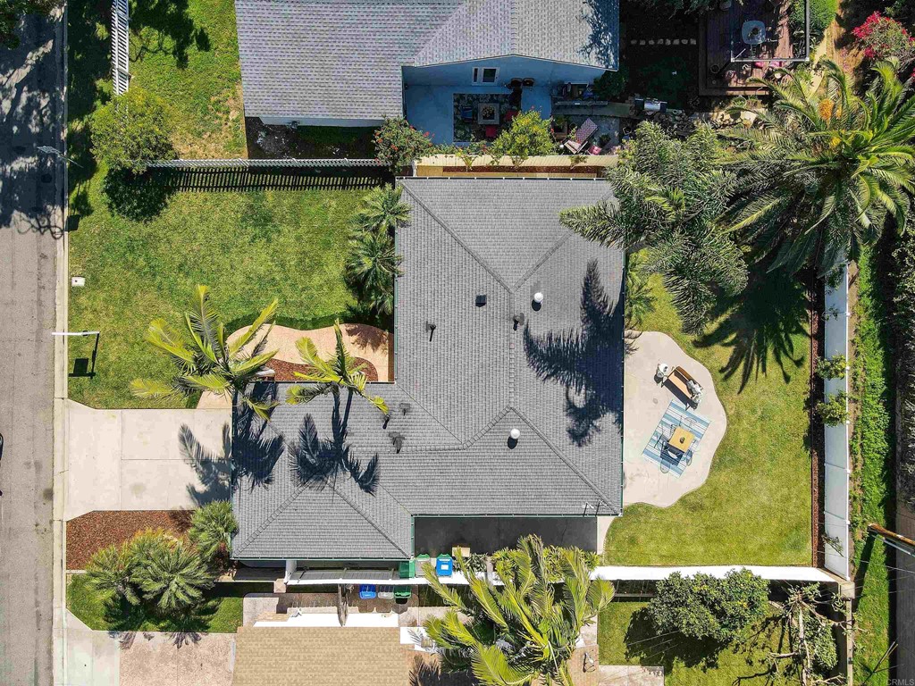 3915 Linmar Lane Carlsbad, CA 92008 - Photo 4 of 25 an aerial view of a house with garden space and a car park in front