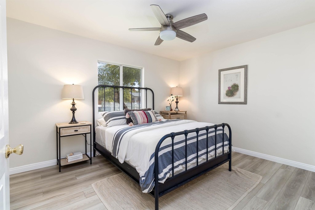 3915 Linmar Lane Carlsbad, CA 92008 - Photo 5 of 25 a bedroom with a bed and window