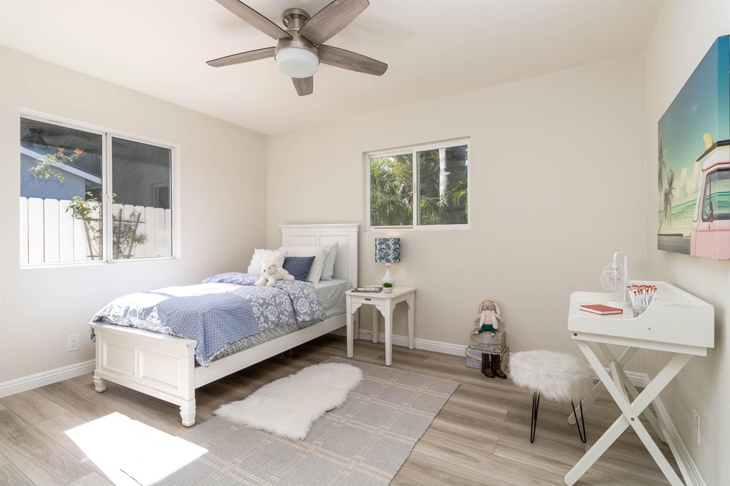 3915 Linmar Lane Carlsbad, CA 92008 - Photo 7 of 25 a bedroom with a bed and a window
