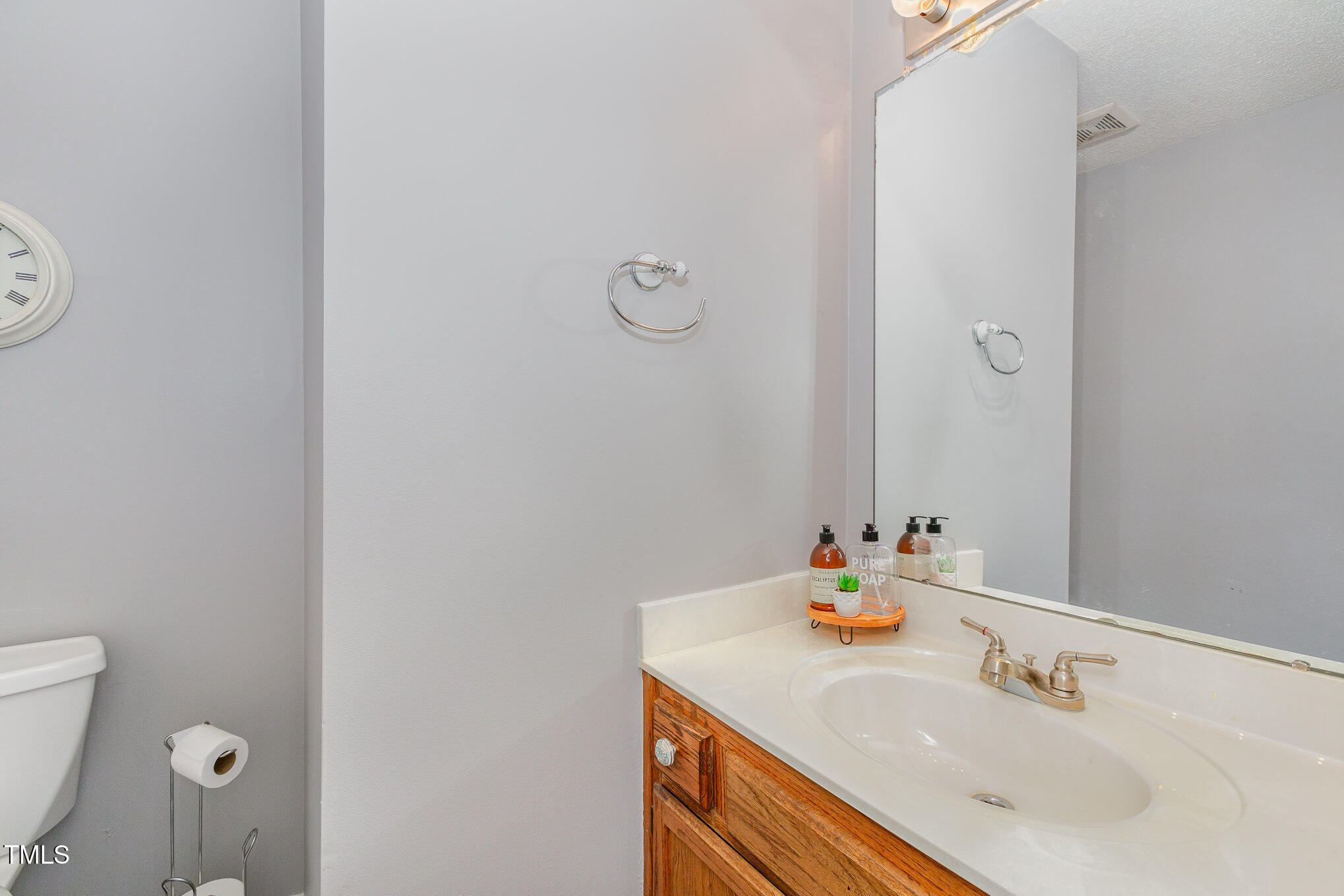 6101 Powder Horn Court Raleigh, NC 27616 - Photo 22 of 24 main level 1/2 bath