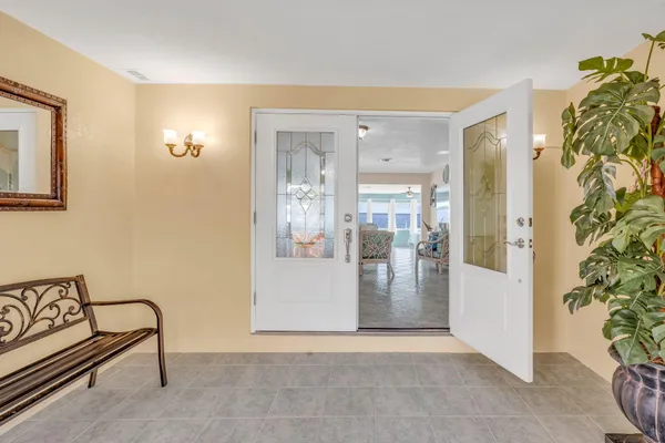 a view of a swimming pool with a patio