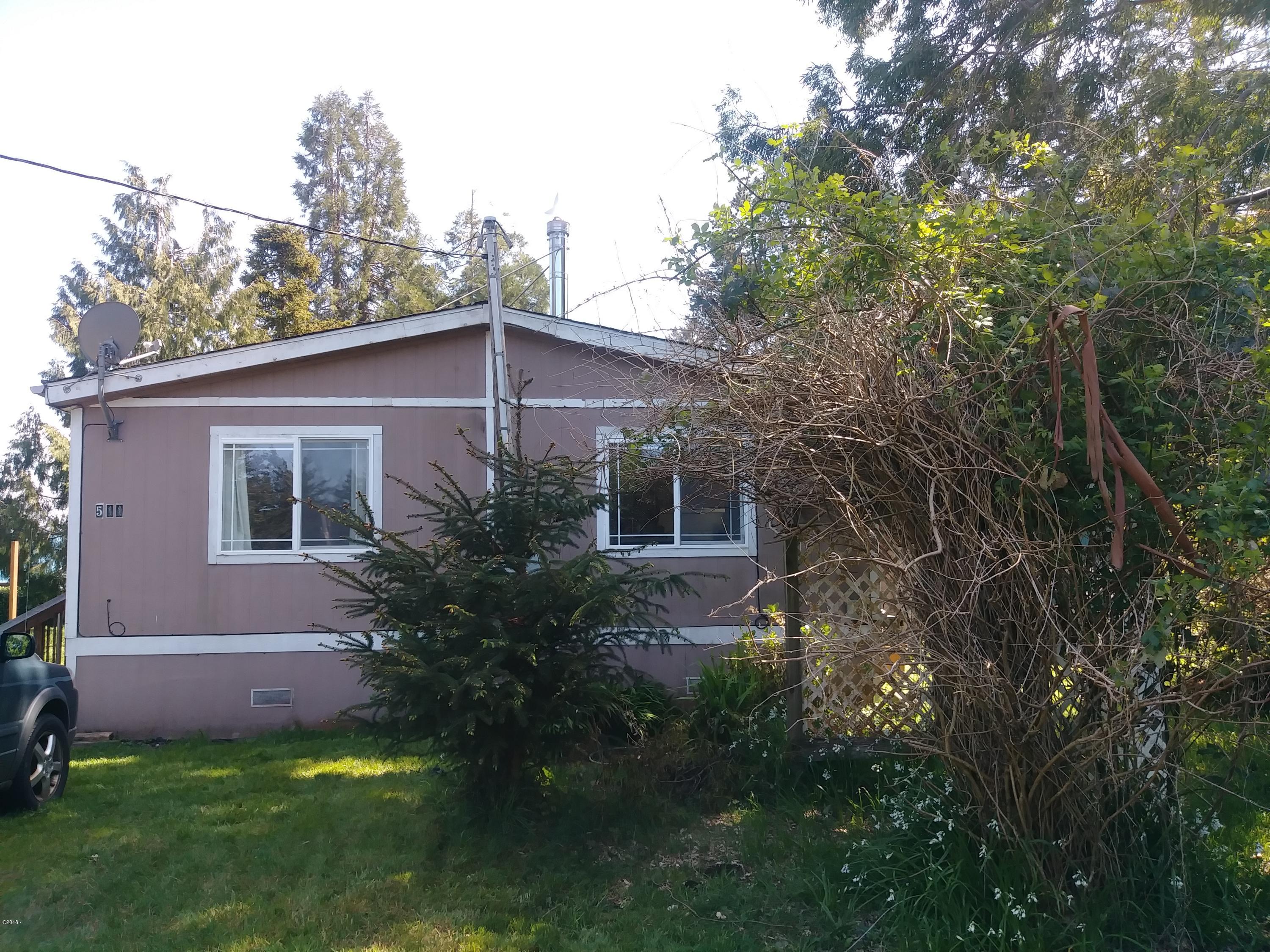 511 Southeast Moffitt Road Waldport, OR 97394 - Photo 2 of 37 Front