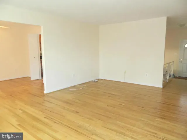 a view of empty room with windows