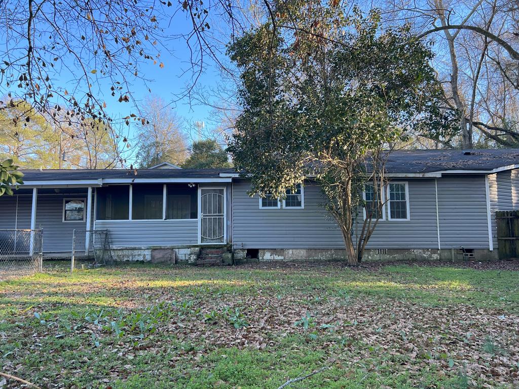 707 12th Court, Unit B Phenix City, AL 36867 - Photo 1 of 2 a view of a house with a yard