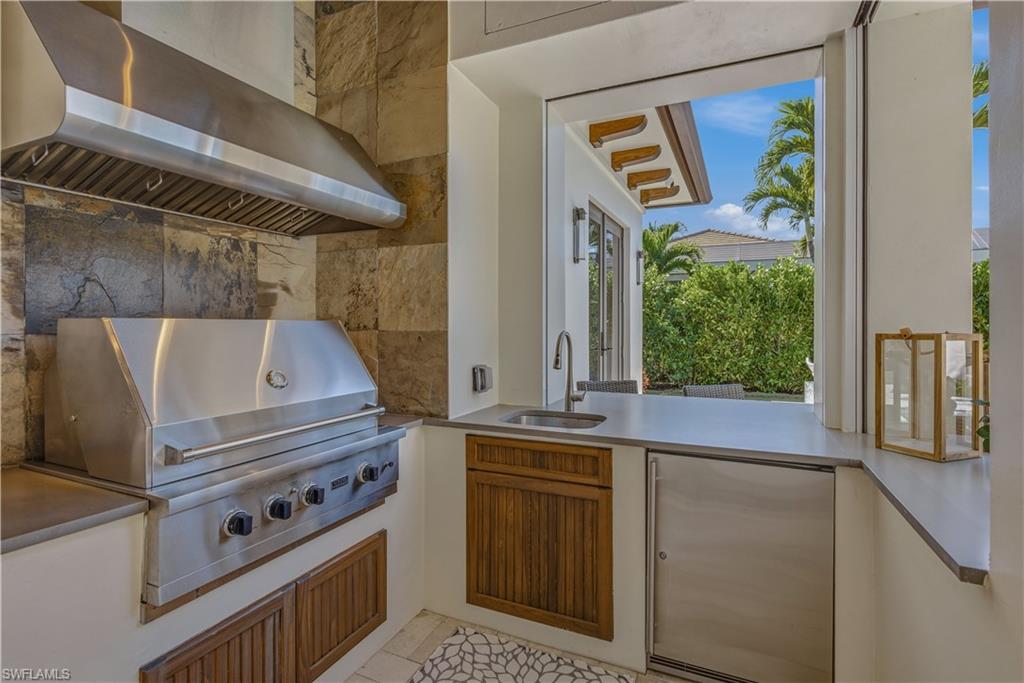 600 Anchor Rode Drive Naples, FL 34103 - Photo 21 of 29 Outdoor Kitchen and Bar