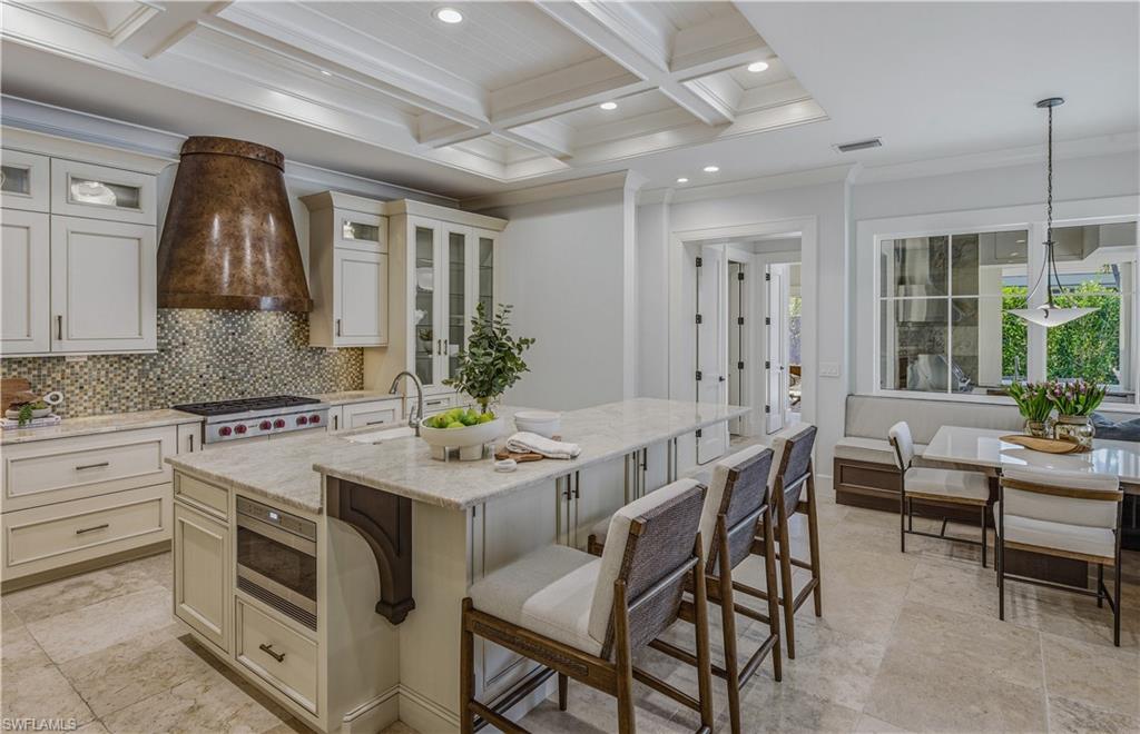 600 Anchor Rode Drive Naples, FL 34103 - Photo 7 of 29 Gourmet Kitchen w/ Custom Cabinetry & Premium Appliances