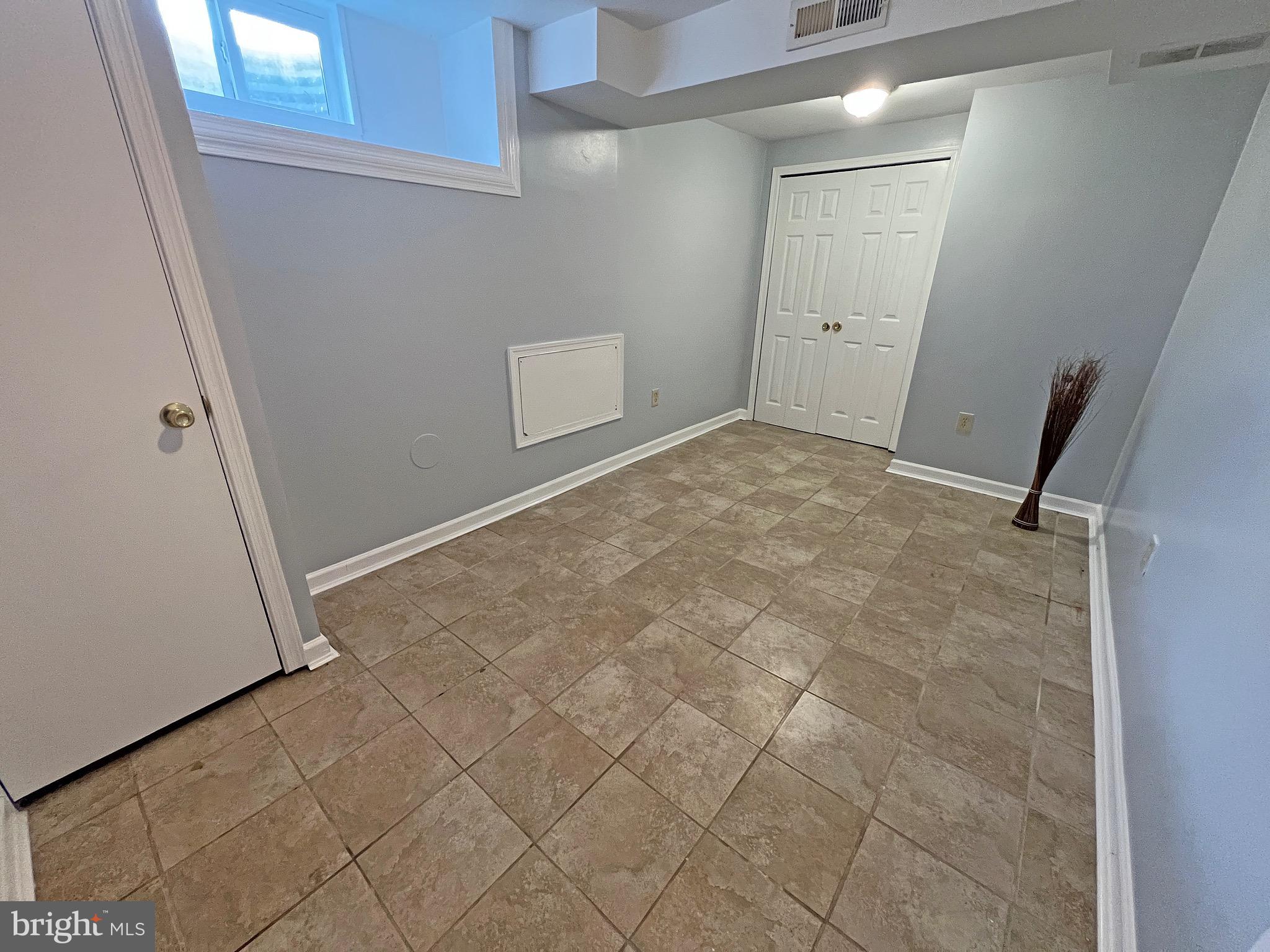 1049 Old Forge Road New Castle, DE 19720 - Photo 25 of 27 Lower level den with tile floors