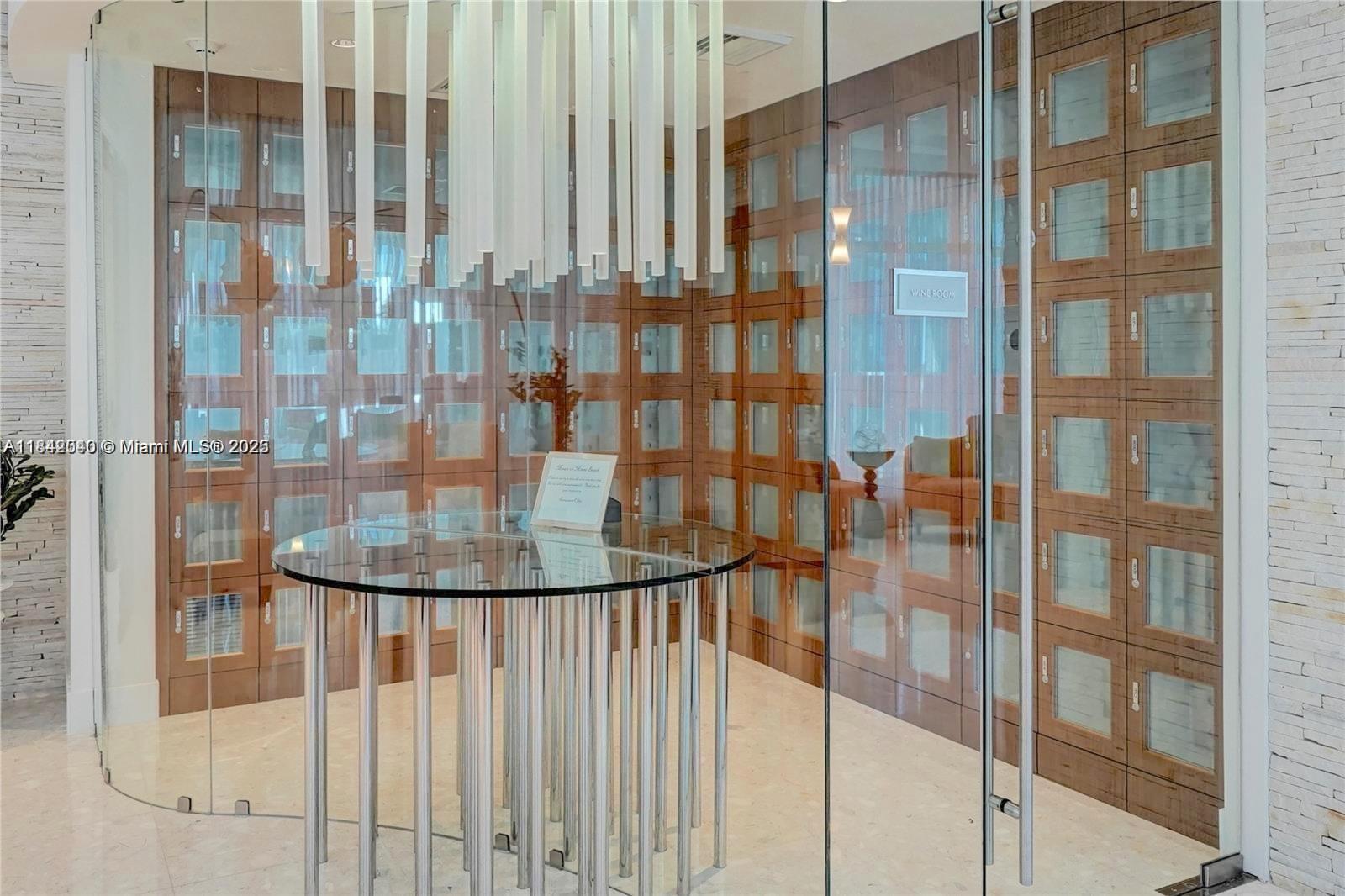 3801 Collins Avenue, Unit 1104 Miami Beach, FL 33140 - Photo 35 of 43 a view of staircase with white walls