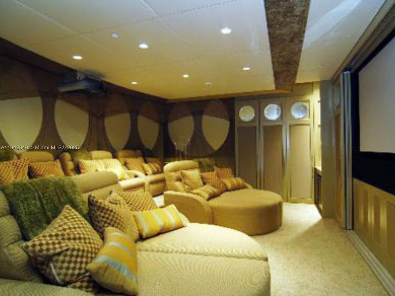 3801 Collins Avenue, Unit 1104 Miami Beach, FL 33140 - Photo 38 of 43 a balcony with furniture and a large window