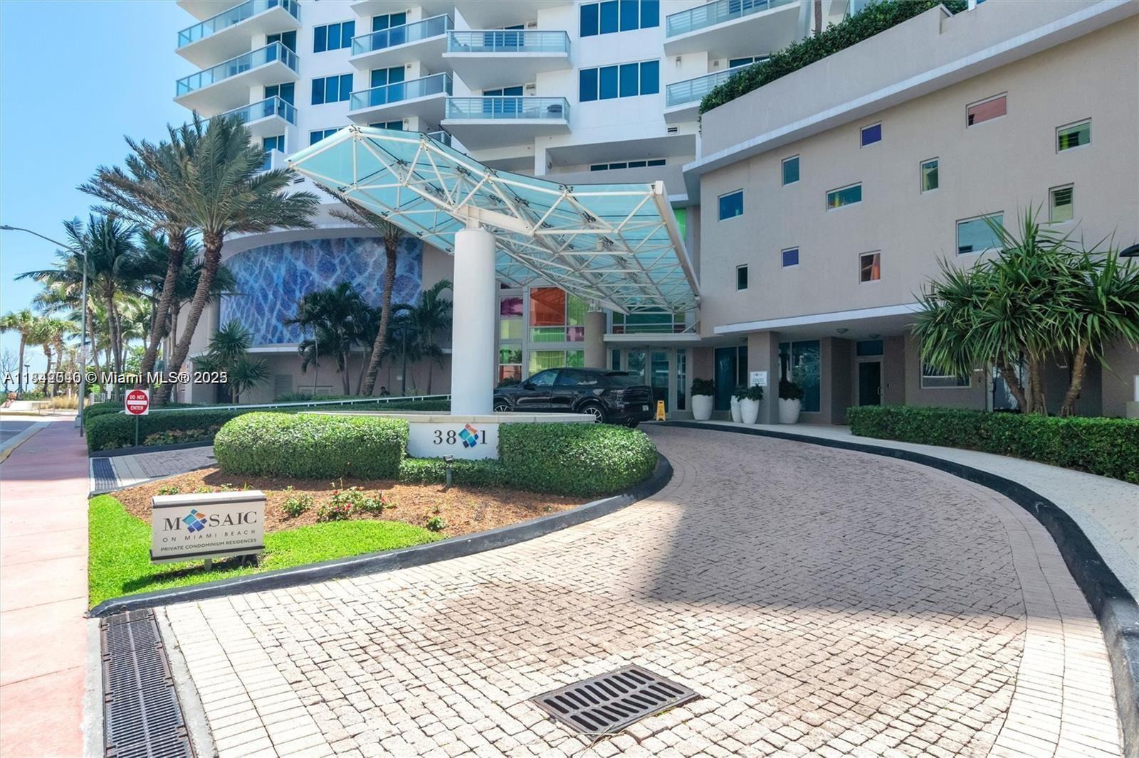 3801 Collins Avenue, Unit 1104 Miami Beach, FL 33140 - Photo 39 of 43 a front view of a building with garden