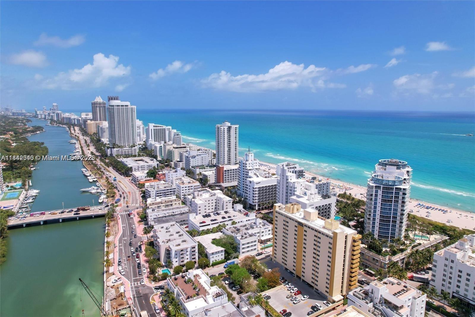 3801 Collins Avenue, Unit 1104 Miami Beach, FL 33140 - Photo 41 of 43 a picture of city view with lake view and boat