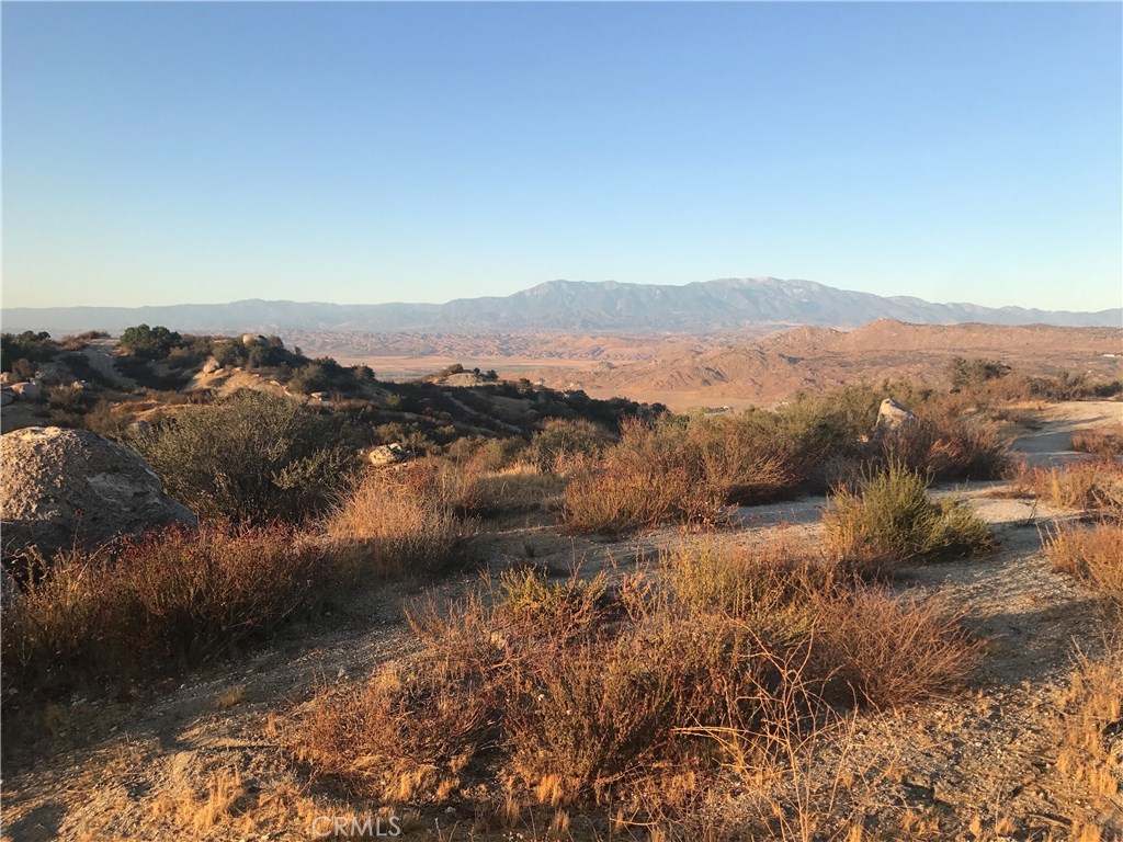 21 Polley Street Nuevo, CA 92567 - Photo 17 of 22 a view of lake with mountain