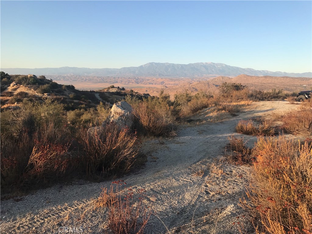 21 Polley Street Nuevo, CA 92567 - Photo 5 of 22 a view of a town with mountains in the background