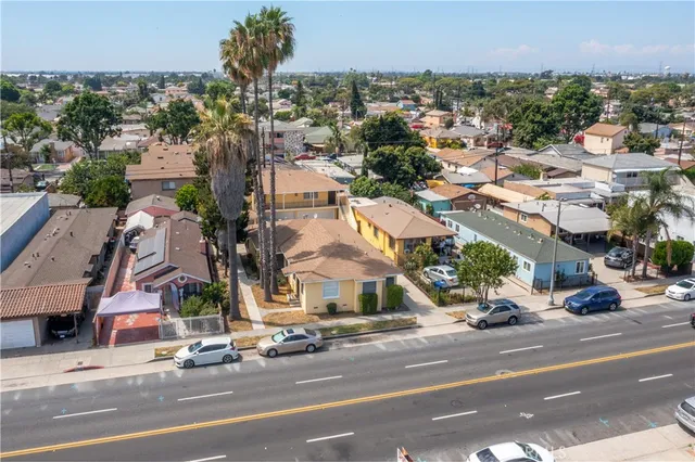 an aerial view of a city with streets and houses