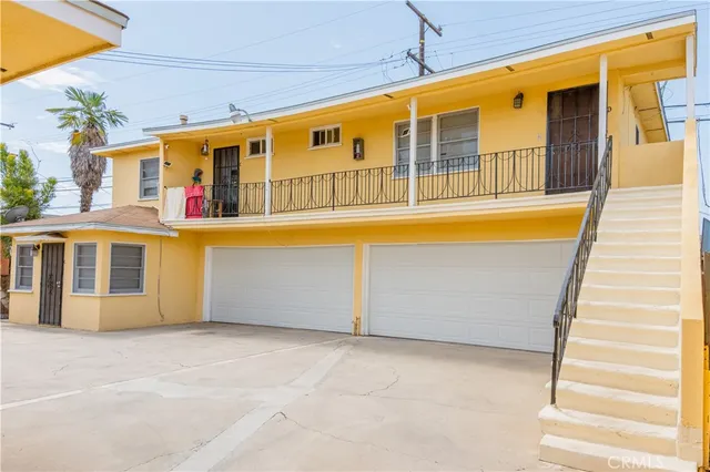 a front view of a house with a swimming pool