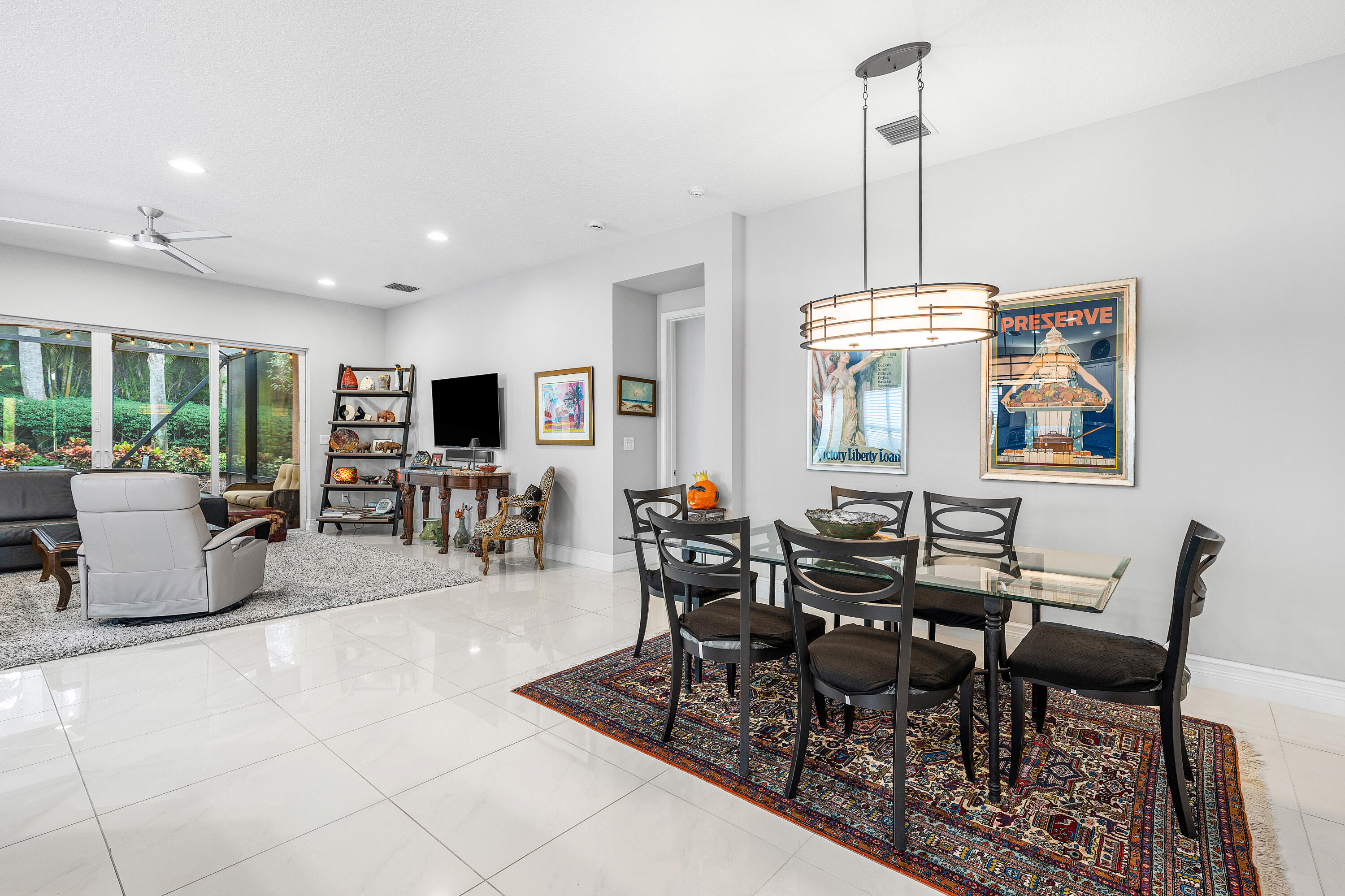 11639 Dawson Range Road Boynton Beach, FL 33473 - Photo 14 of 75 a dining room with furniture a chandelier and wooden floor