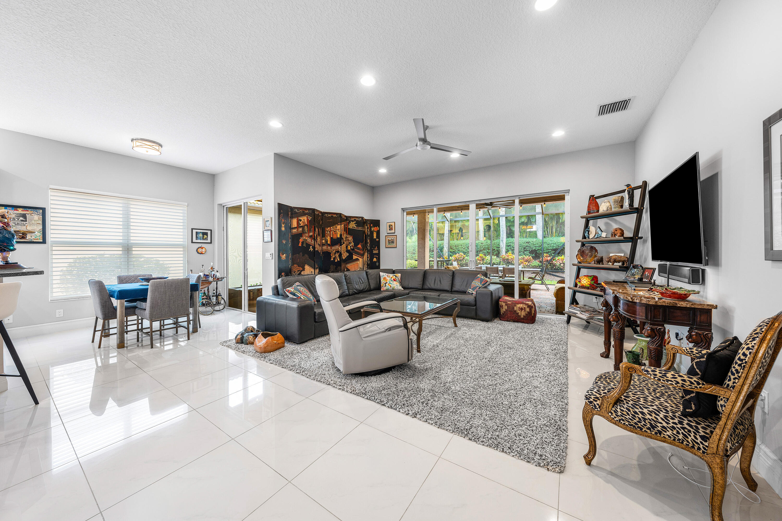 11639 Dawson Range Road Boynton Beach, FL 33473 - Photo 15 of 75 a living room with lots of furniture and a flat screen tv