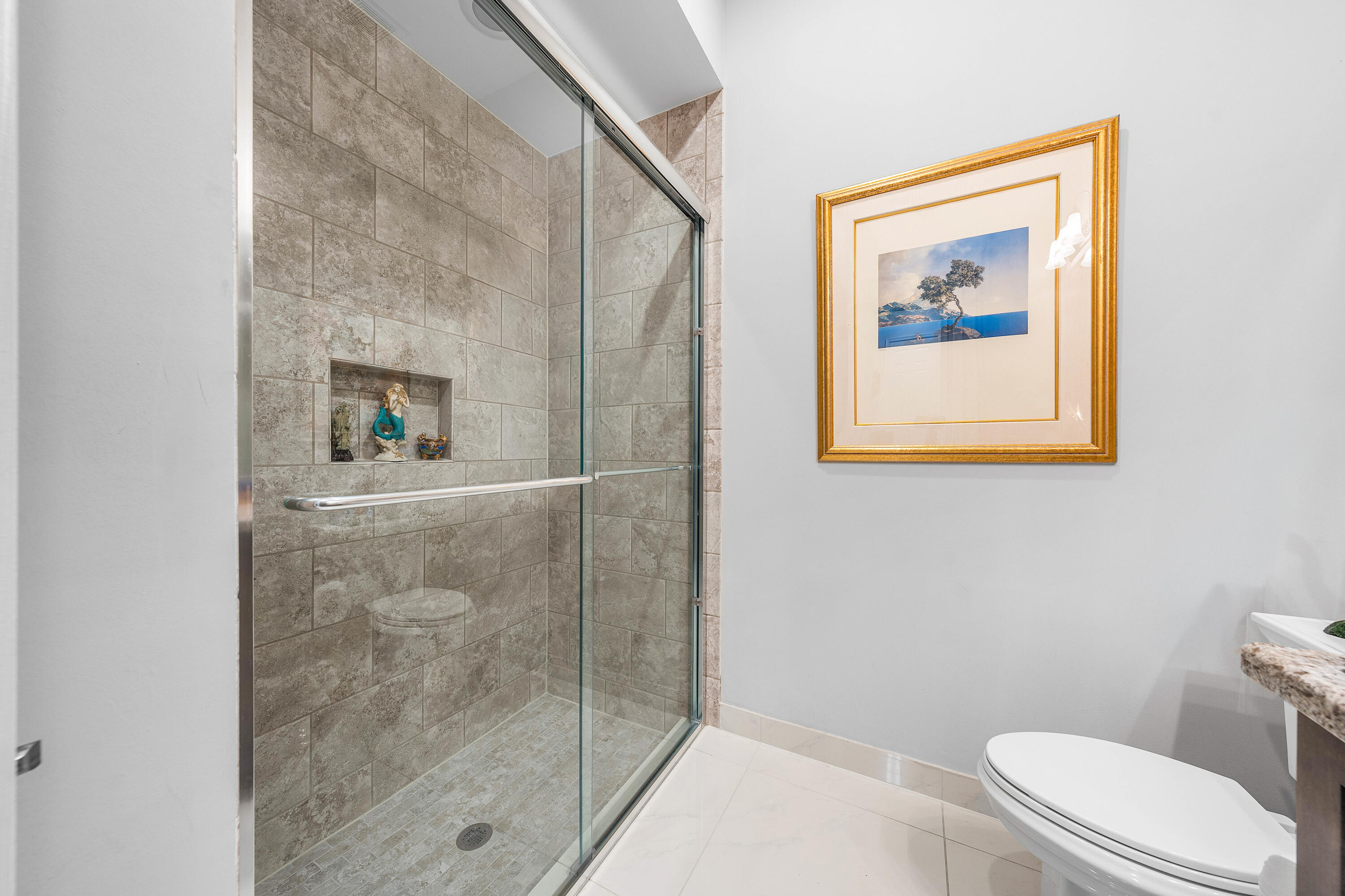 11639 Dawson Range Road Boynton Beach, FL 33473 - Photo 28 of 75 a bathroom with a toilet and a shower