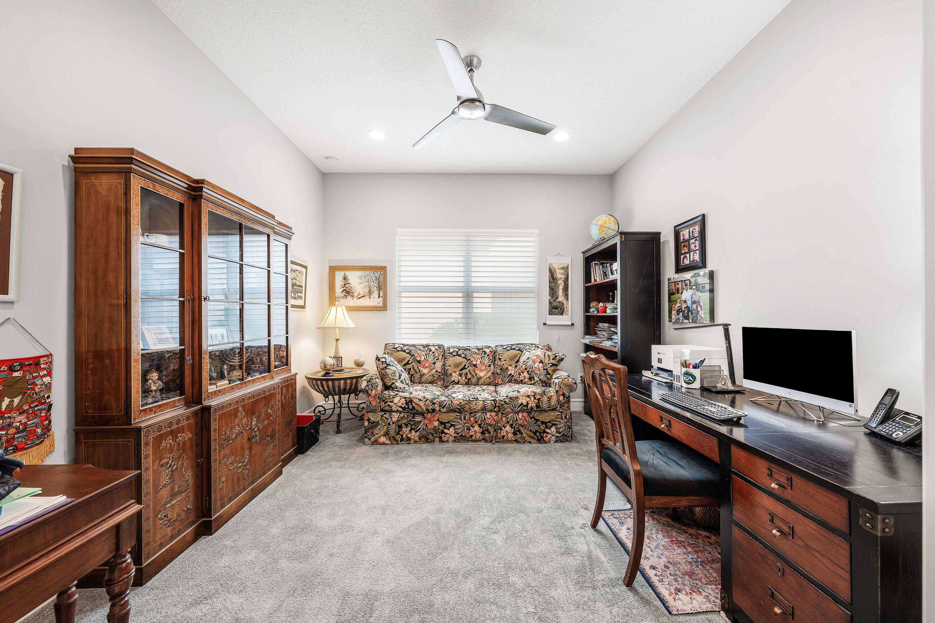 11639 Dawson Range Road Boynton Beach, FL 33473 - Photo 29 of 75 a view of a workspace with furniture and a window