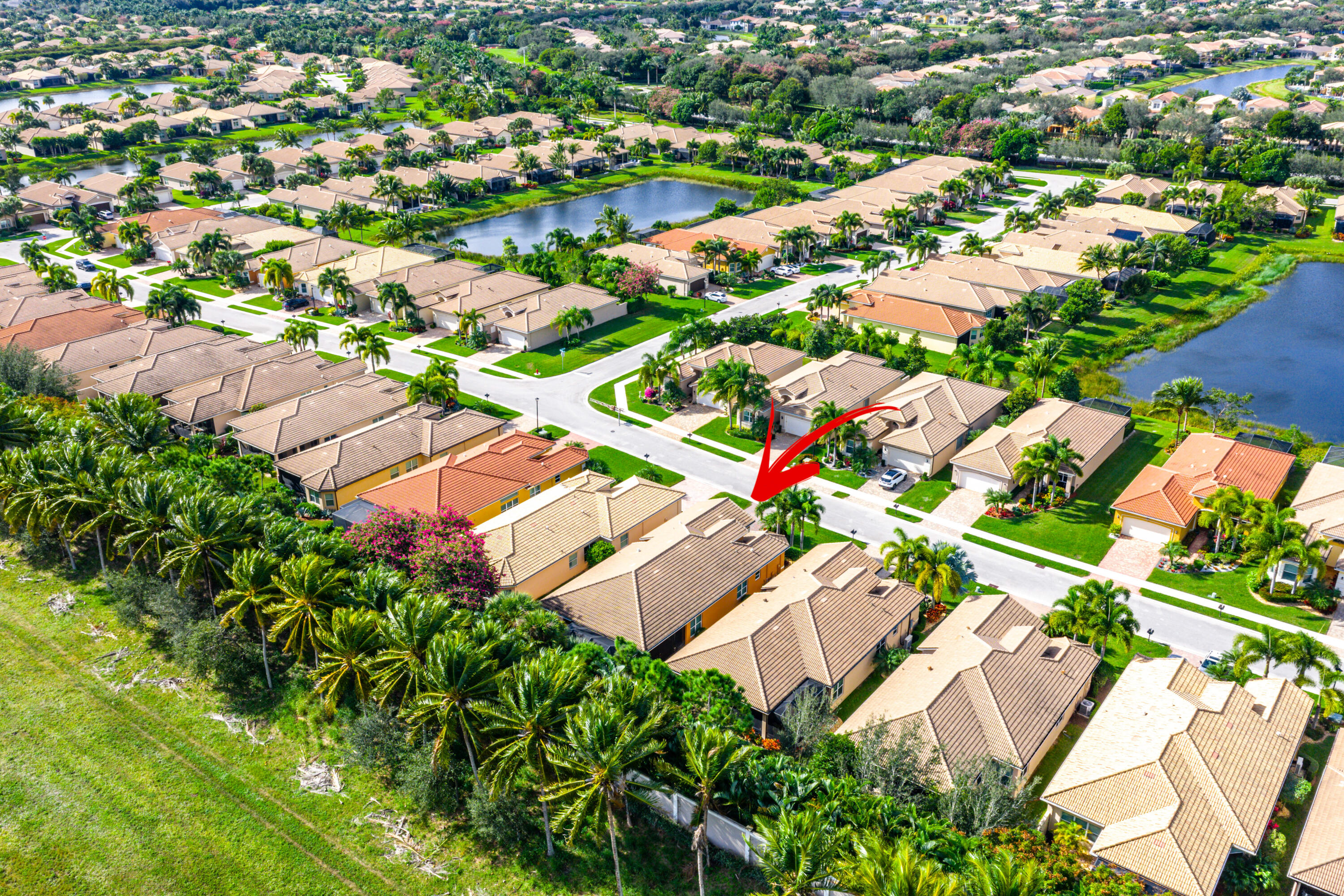 11639 Dawson Range Road Boynton Beach, FL 33473 - Photo 44 of 75 an aerial view of residential houses with outdoor space