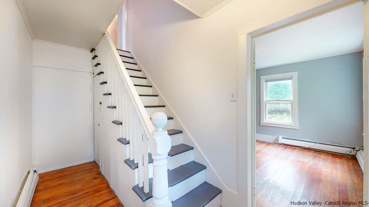3418 Cooper Street Stone Ridge, NY 12484 - Photo 12 of 34 a view of a hallway with front door